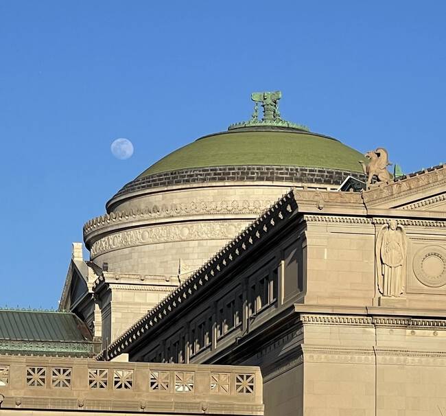 The moon over the Museum of Science and Industry